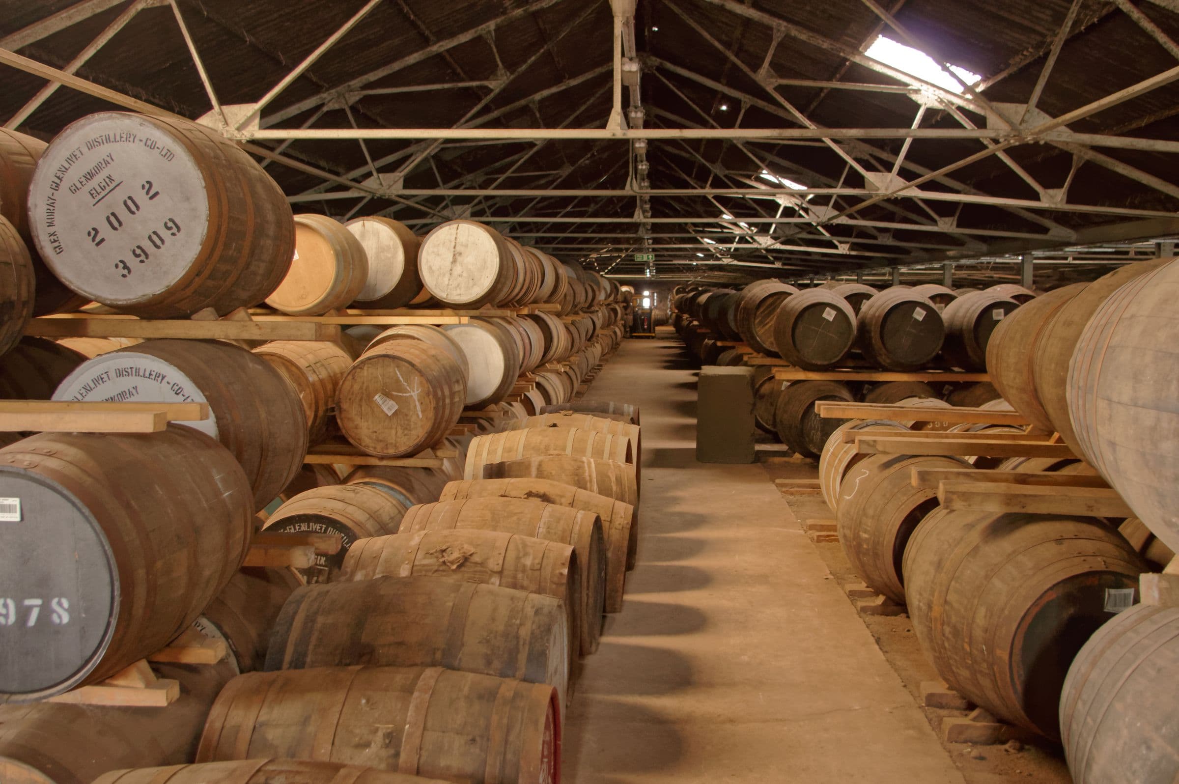Barrels aging in a rickhouse